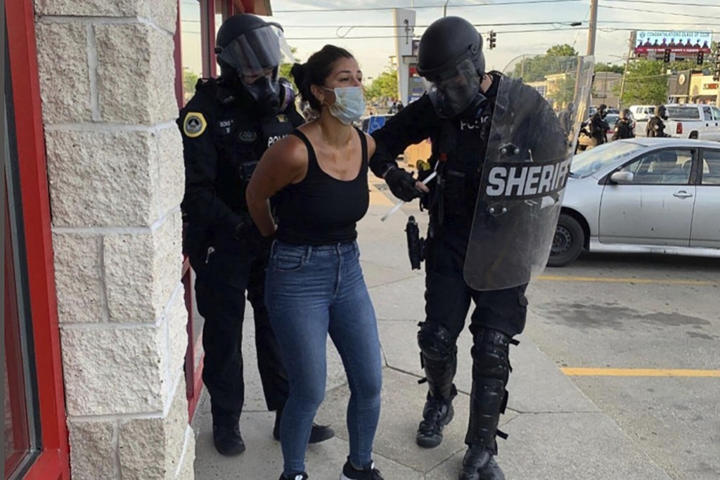 Officer Says He Arrested Reporter After Pepper Spray Blasts