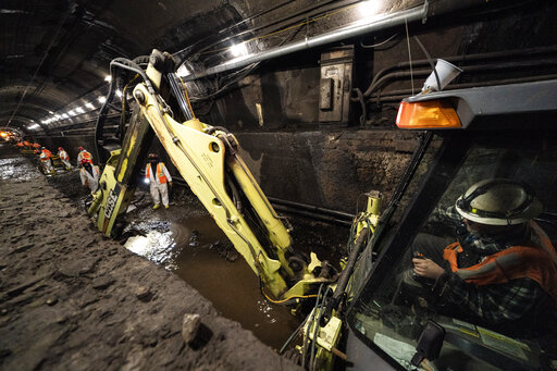 In A Leaky Underwater Rail Tunnel, Workers Race Against Time