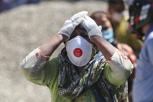 Ap Photos: India’s Deadly Virus Surge Follows Crowded Events