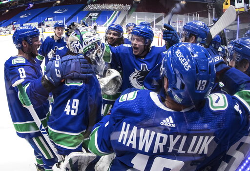 Canucks Top Leafs 3 2 In Ot In Return From Covid Layoff