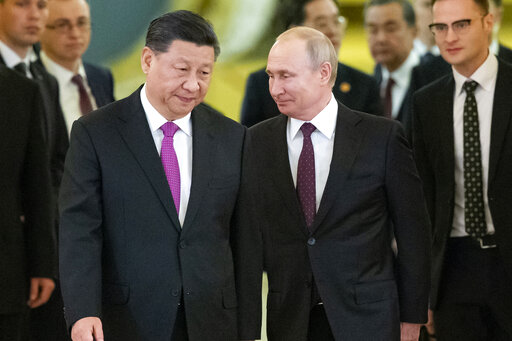 Leaders Of Russia And China Tighten Their Grips, Grow Closer