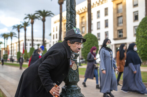 Ap Photos: Moroccan Mimics Charlie Chaplin To Mask Hardships