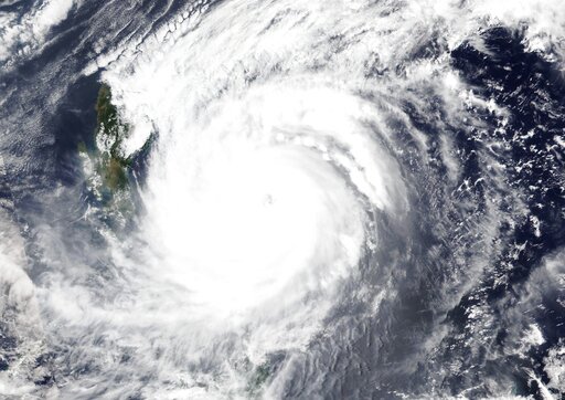 1 Dead, 100,000 Displaced As Typhoon Blows Near Philippines