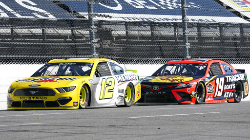 Truex Outlasts Teammate Hamlin To Win Again At Martinsville