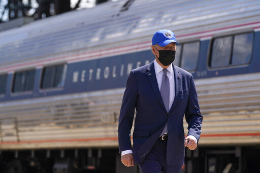 Adviser Suggests Biden Still Wears Mask Outside Out Of Habit