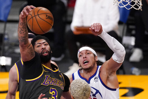 Davis Scores 25 As Short Handed Lakers Defeat Nuggets 93 89