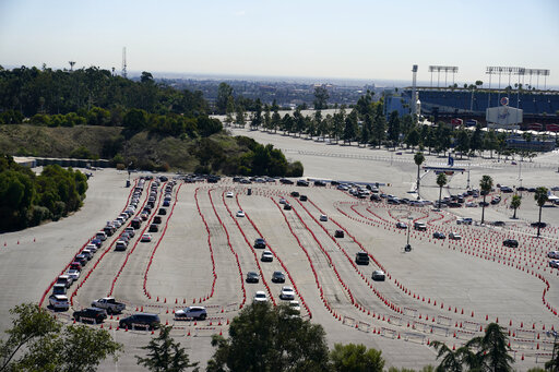 The Latest: Dodgers To Have More Vaccinated Only Sections