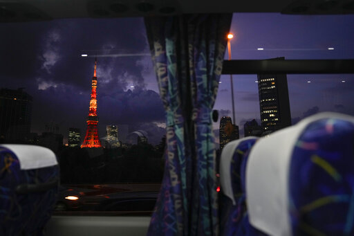 Ap Photos: Olympic Guests Get View Of Tokyo — From The Bus