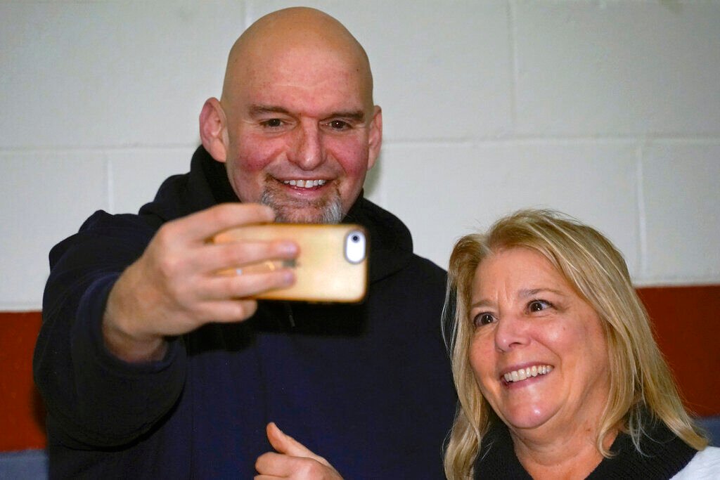 <p>Democratic candidate for the Pennsylvania U.S. Senate seat in the 2022 primary election, Lt. Gov. John Fetterman, left, takes a selfie with Barbara Speer during a campaign stop at the Mechanistic Brewery, in Clarion, Pa., Saturday, Feb. 12, 2022. </p>
