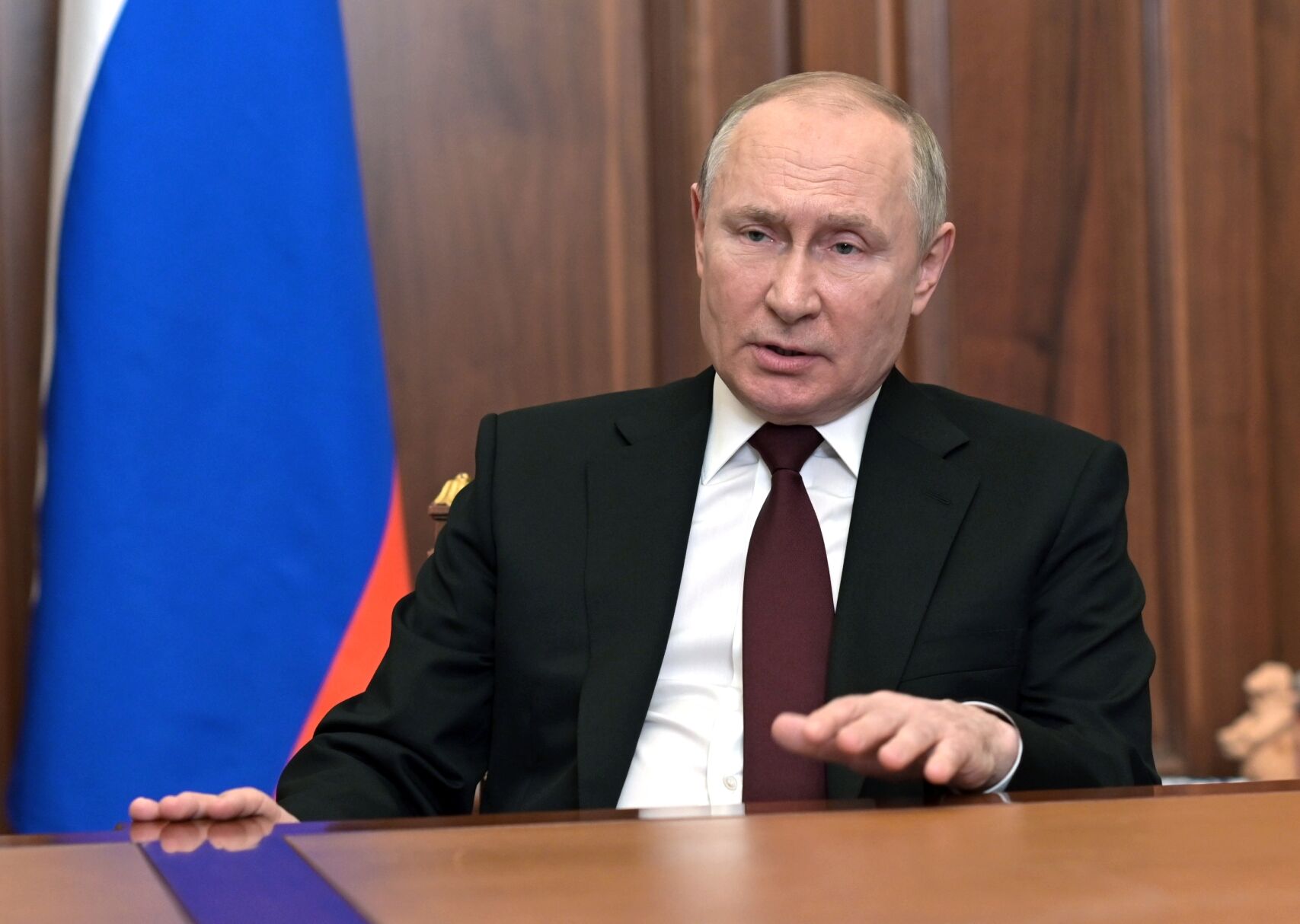 <p>Russian President Vladimir Putin addresses the nation in the Kremlin in Moscow, Russia, Monday, Feb. 21, 2022. Russia's Putin has recognized the independence of separatist regions in eastern Ukraine, raising tensions with West.</p>