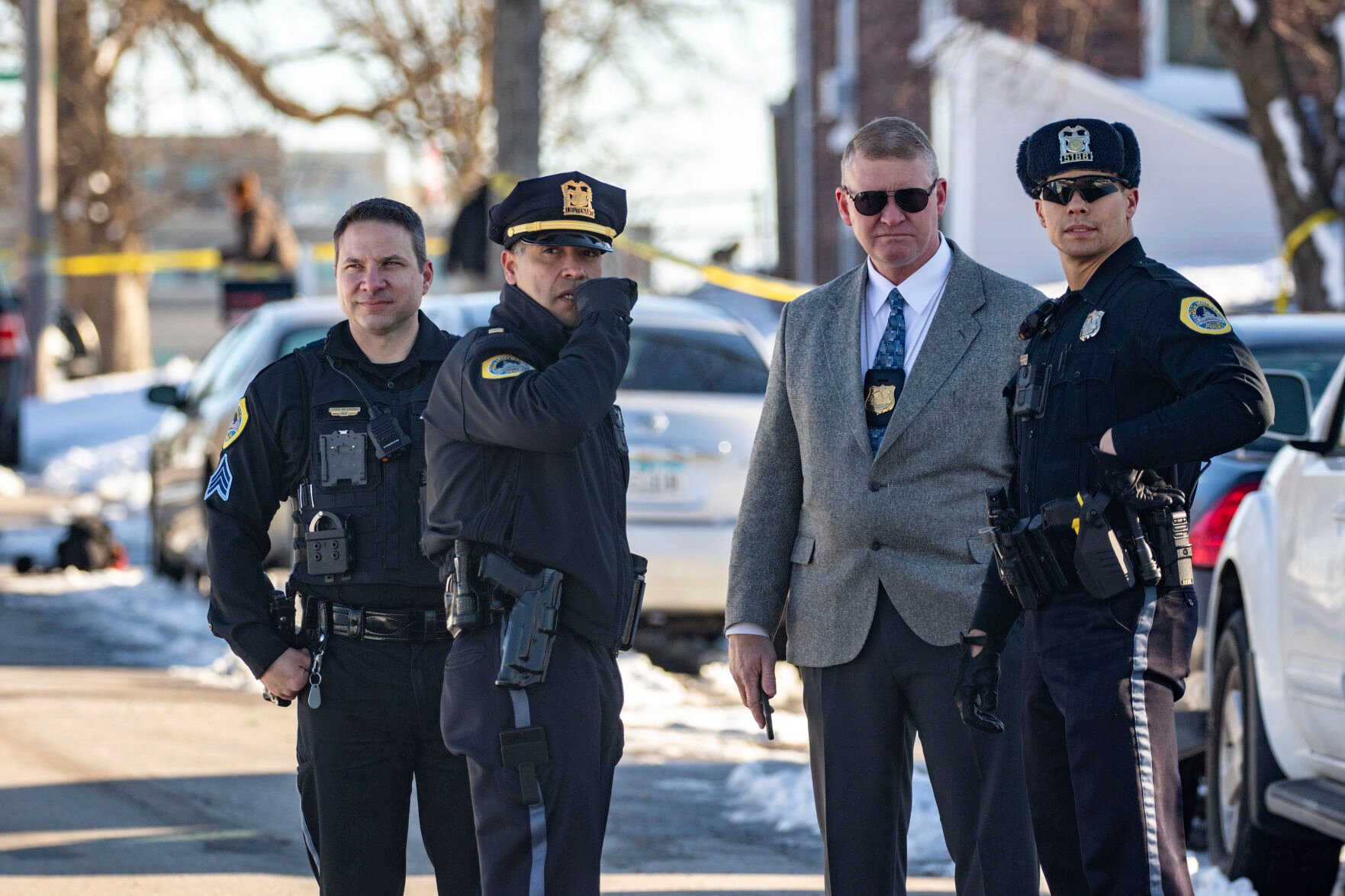 <p>Police investigate a shooting outside of East High School in in Des Moines, Iowa, on Monday, March 7, 2022. (Zach Boyden-Holmes/The Des Moines Register via AP)</p>