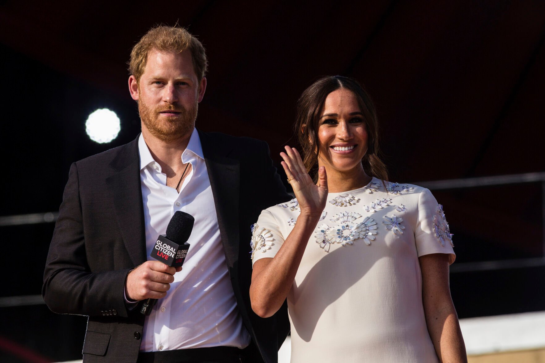 <p>FILE - Prince Harry and his wife Meghan speak during the Global Citizen festival, on Sept. 25, 2021 in New York. Prince Harry and his wife Meghan have visited Queen Elizabeth II at Windsor Castle on their first joint visit to the U.K. since they gave up formal royal roles and moved to the U.S. more than two years ago. The couple’s office says they visited the 95-year-old queen, Harry’s grandmother, Thursday, April 14, 2022 on their way to the Netherlands to attend the Invictus Games (AP Photo/Stefan Jeremiah, File)</p>