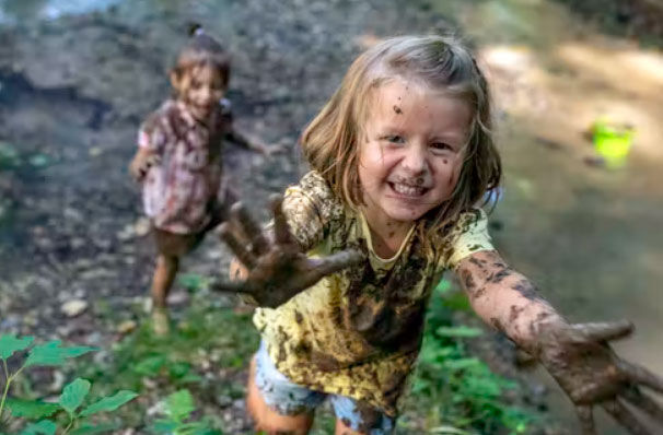 <p><span class="caption">Stain-resistance can mean questionable chemicals in children's clothes.</span> <span class="attribution"><a class="source" href="https://www.gettyimages.com/detail/photo/smiling-little-muddy-girl-royalty-free-image/1059735838">VM via Getty Images</a></span></p>