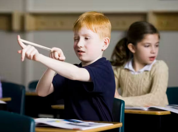 <p><span class="caption">Misbehavior increases the risk of being bullied.</span> <span class="attribution"><a class="source" href="https://www.gettyimages.com/detail/photo/children-at-school-royalty-free-image/83606485">Rubberball/Nicole Hill/Brand X Pictures via Getty Images</a></span></p>