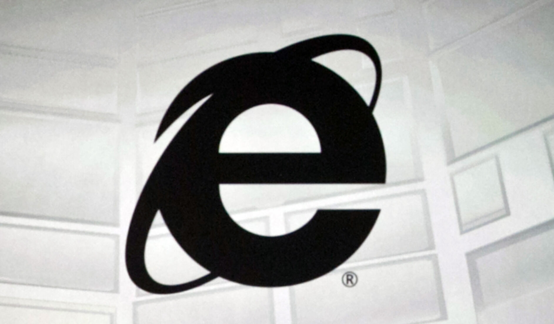 <p>FILE - The Microsoft Internet Explorer logo is projected on a screen during a Microsoft Xbox E3 media briefing in Los Angeles, June 4, 2012. As of Wednesday, June 15, 2022, Microsoft will no longer support the once-dominant browser that legions of web surfers loved to hate and a few still claim to adore. </p>
