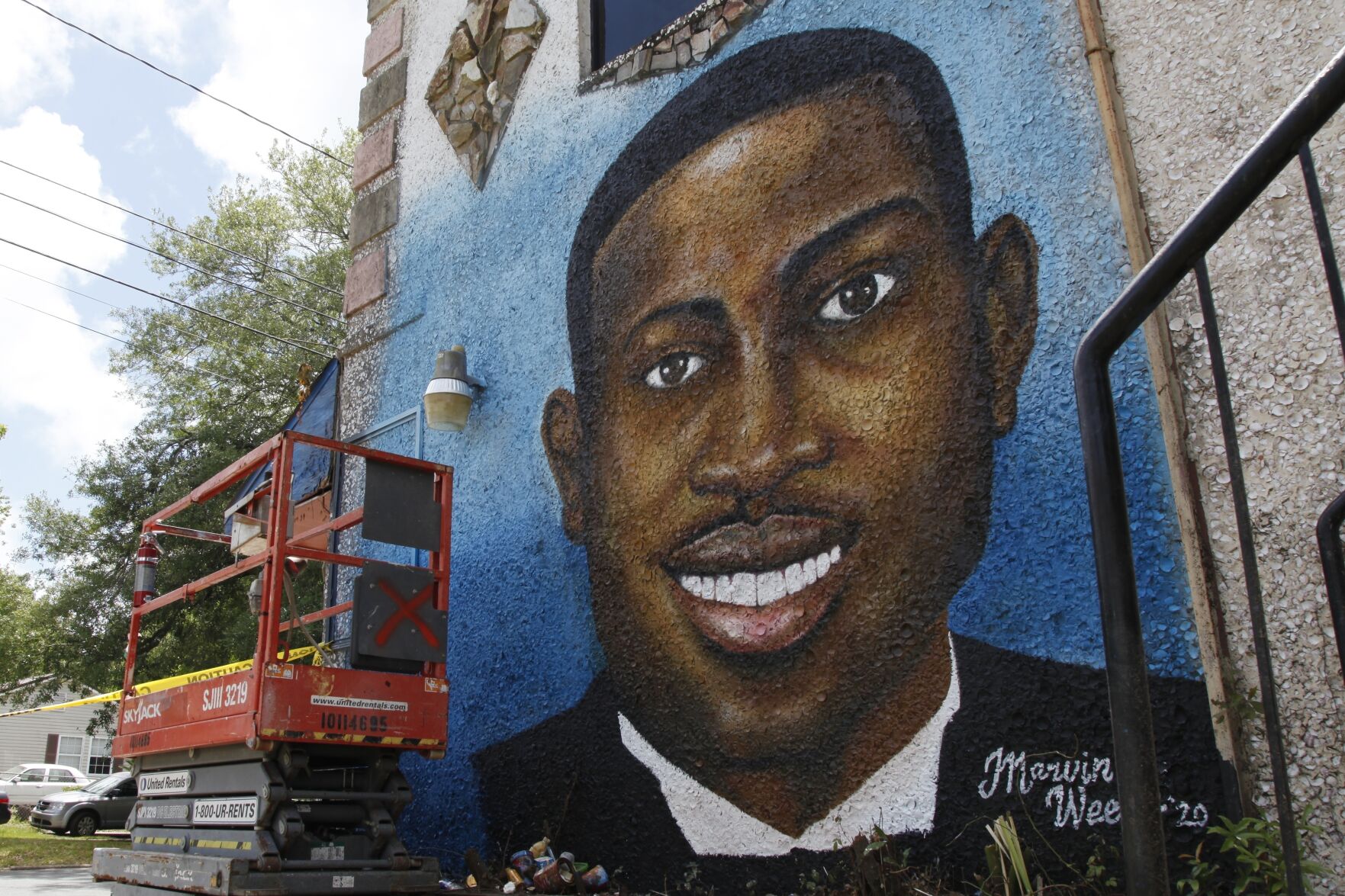<p>A recently painted mural of Ahmaud Arbery is displayed in Brunswick, Ga., on May 17, 2020, where the 25-year-old man was shot and killed in February. </p>