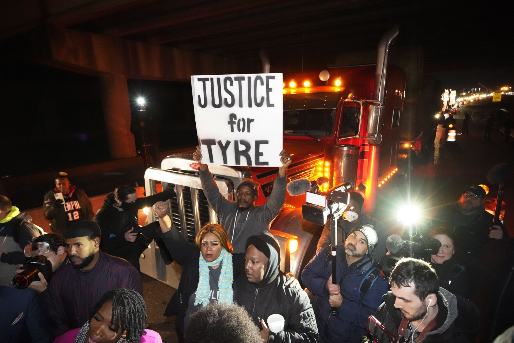 <p>Protesters march down the street Friday, Jan. 27, 2023, in Memphis, Tenn., as authorities release police video depicting five Memphis officers beating Tyre Nichols, whose death resulted in murder charges and provoked outrage at the country's latest instance of police brutality. </p>