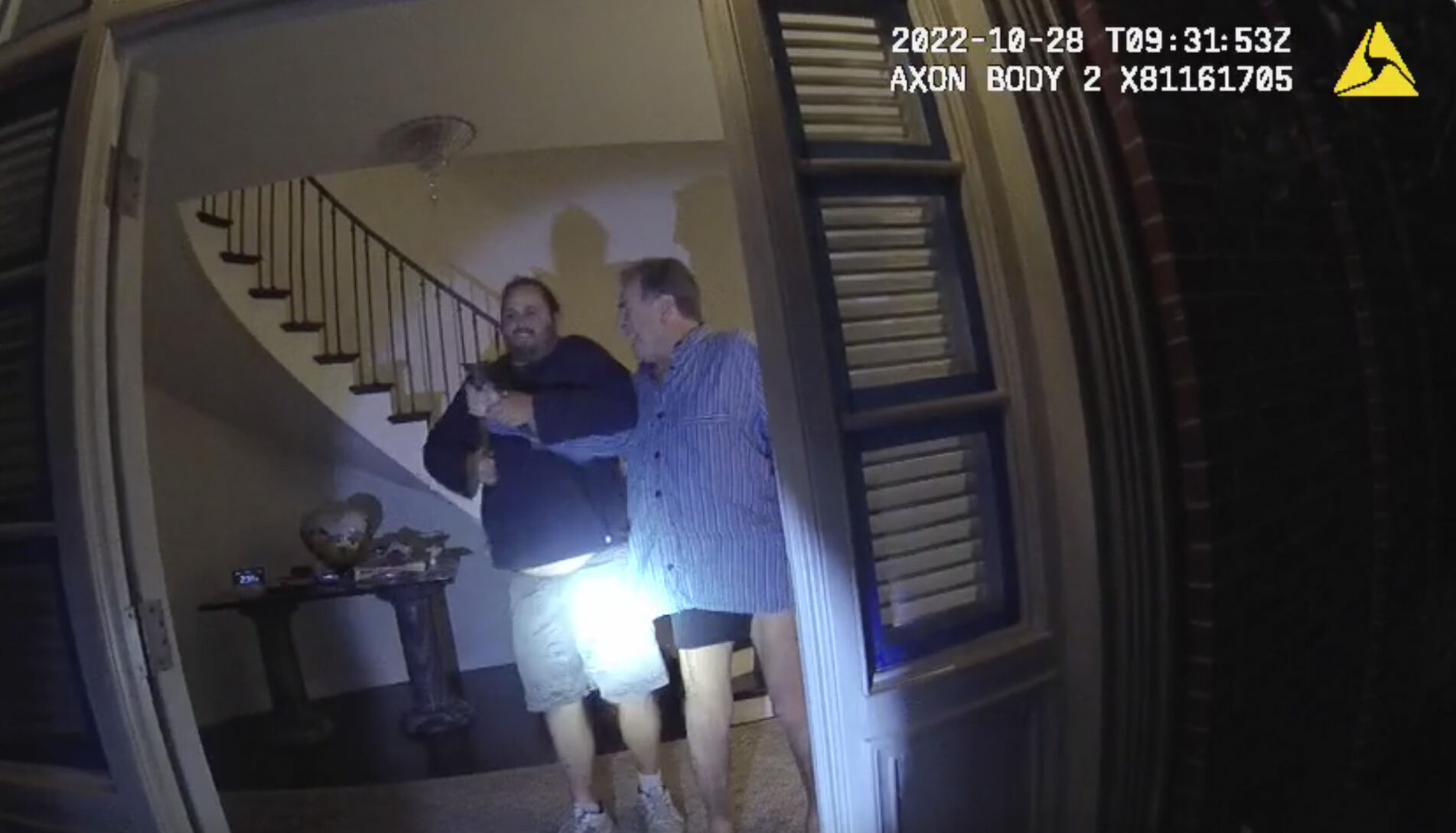 <p>In this image taken from San Francisco Police Department body-camera video, the husband of former U.S. House Speaker Nancy Pelosi, Paul Pelosi, right, fights for control of a hammer with his assailant during a brutal attack in the couple's San Francisco home on Oct. 28, 2022. </p>