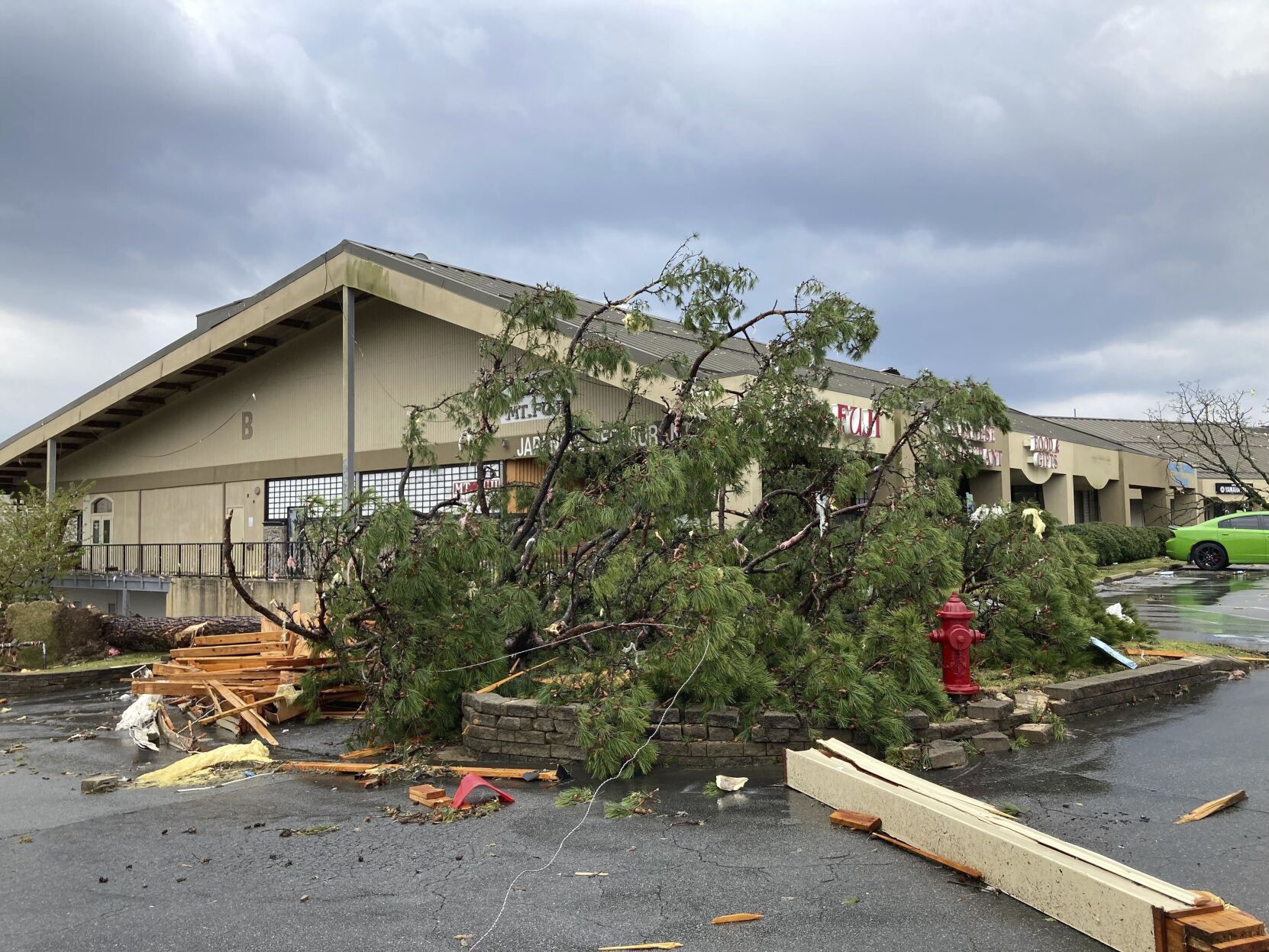 <p>A building is damaged and trees are down after severe storm swept through Little Rock, Ark., on Friday.</p>