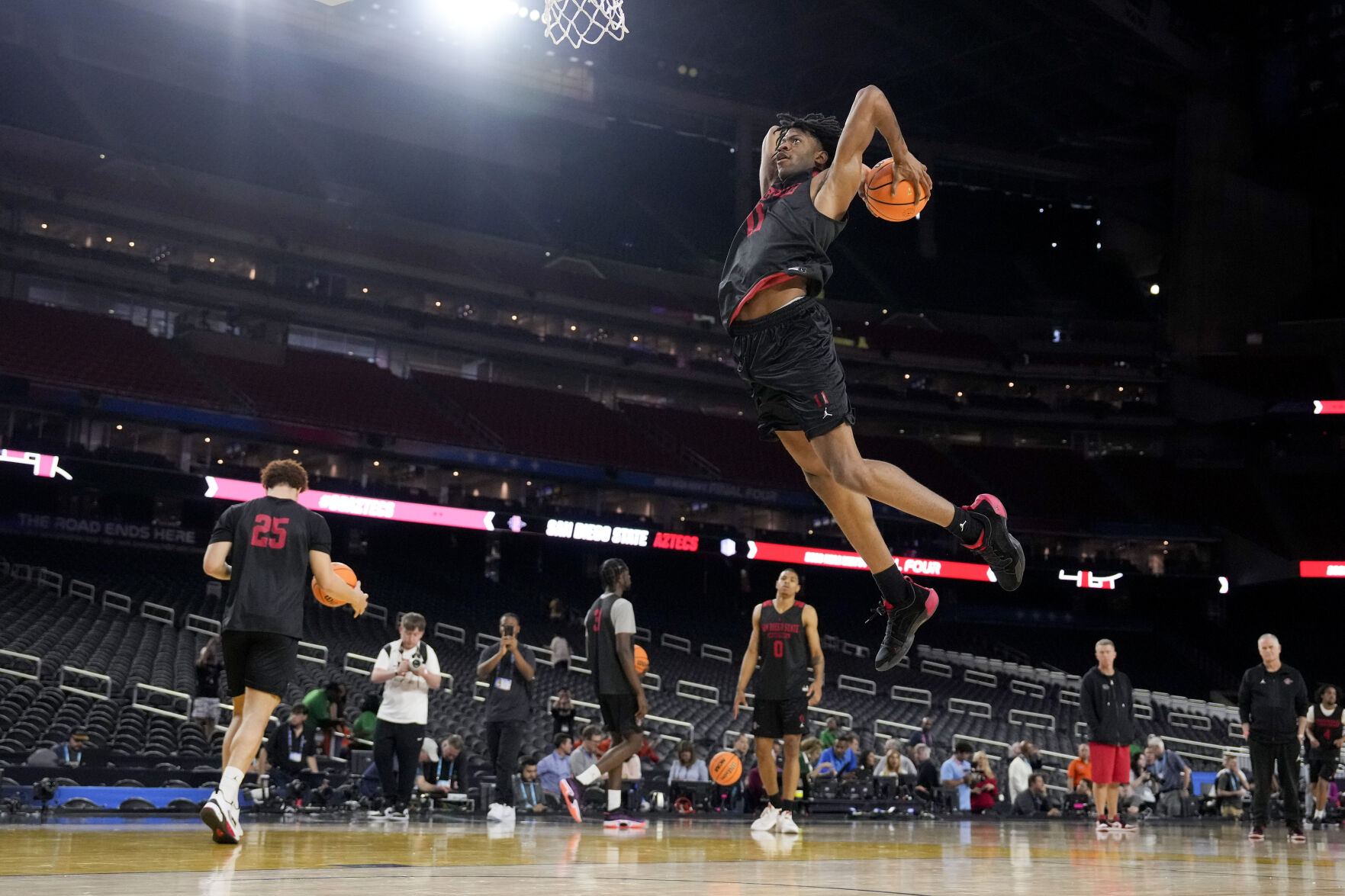 <p>San Diego State forward Demarshay Johnson Jr. practices Friday in Houston.</p>