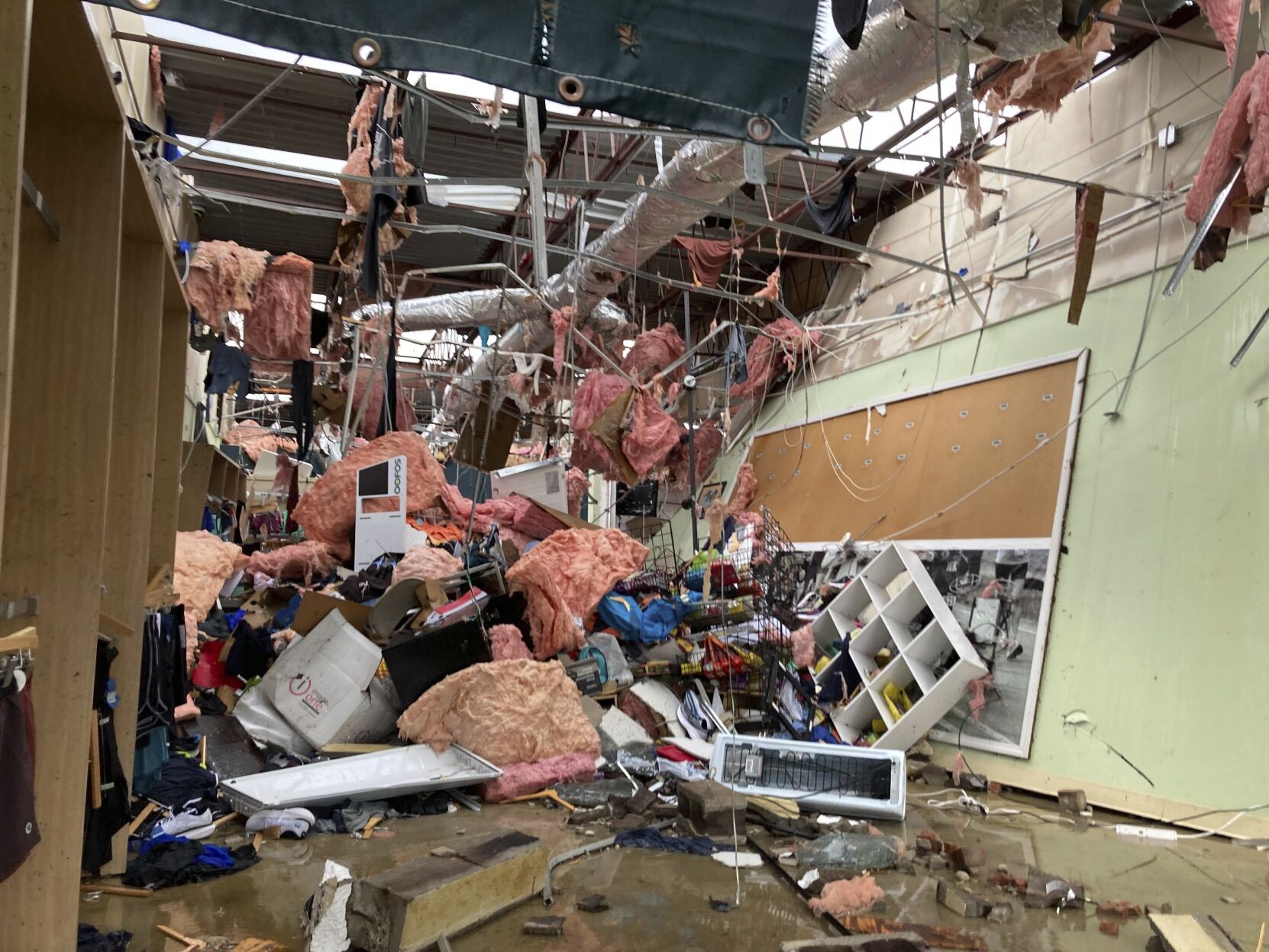 <p>The interior of store is damaged after a severe storm swept through Little Rock, Ark., on Friday.</p>