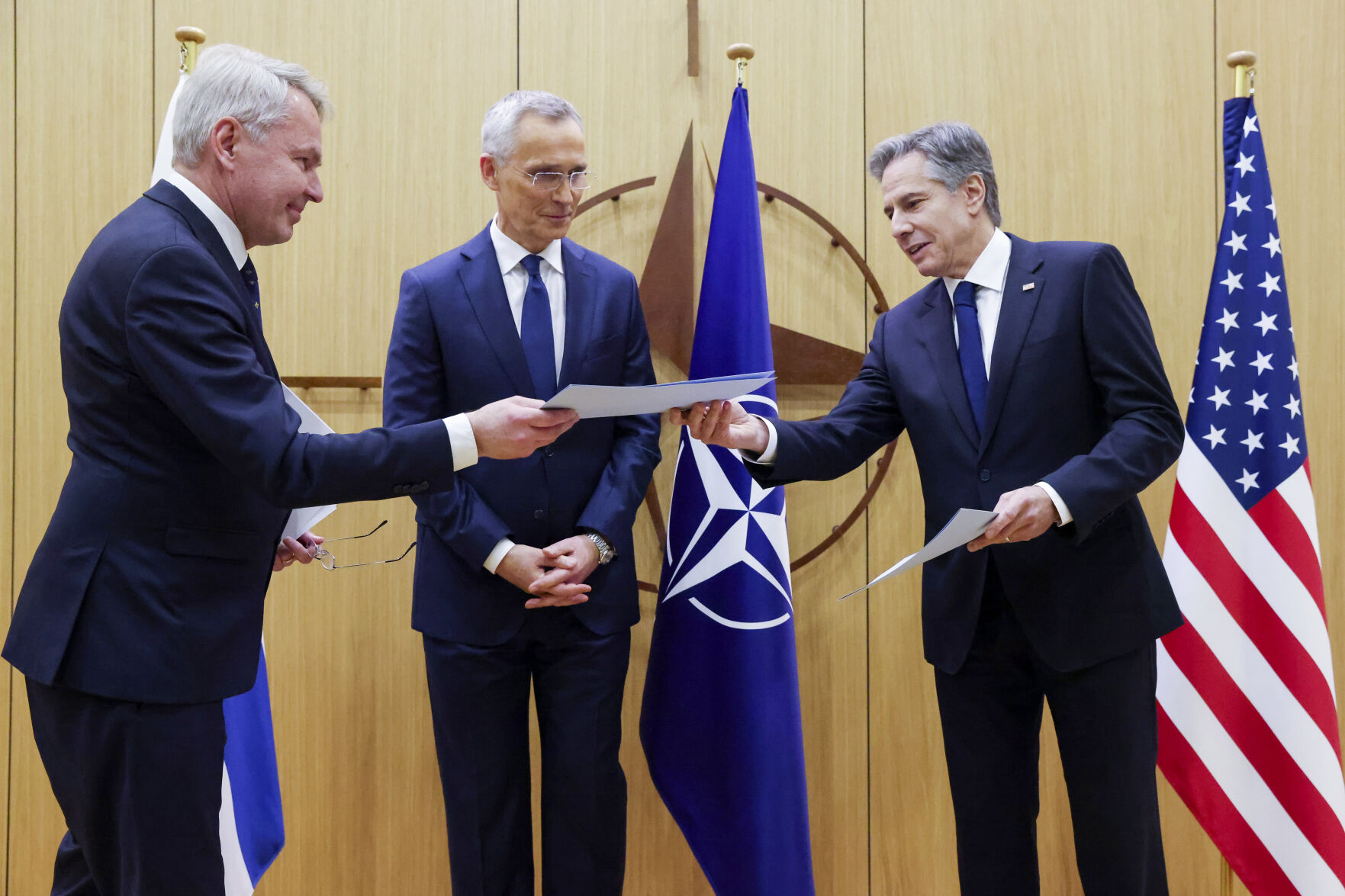 <p>Finnish Foreign Minister Pekka Haavisto, left, hands over his nation's accession document to United States Secretary of State Antony Blinken, right, during a meeting of NATO foreign ministers at NATO headquarters in Brussels, Tuesday, April 4, 2023. </p>