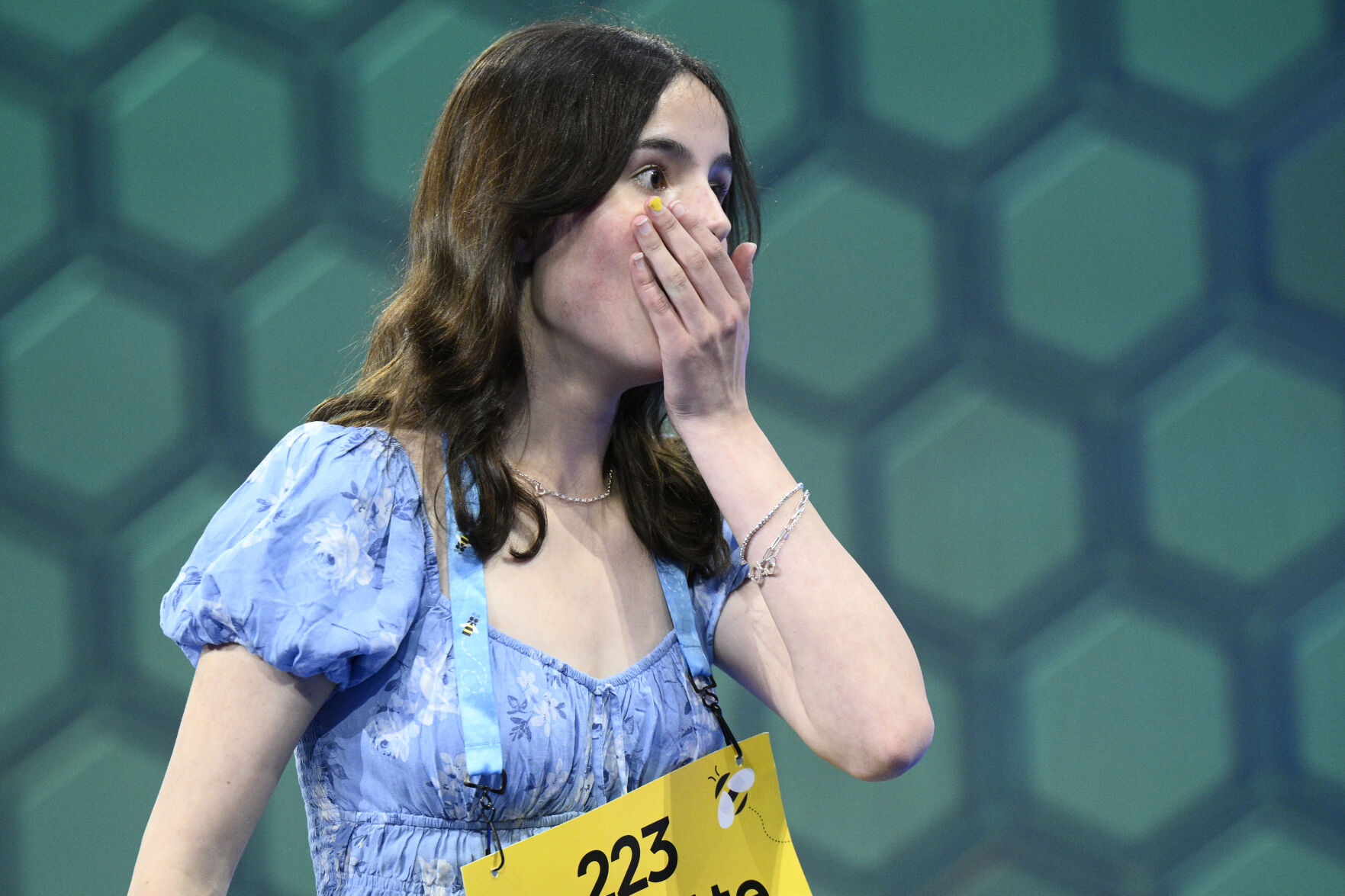 <p>Charlotte Walsh, 14, from Arlington, Va., reacts during the Scripps National Spelling Bee on Wednesday in Oxon Hill, Md. </p>