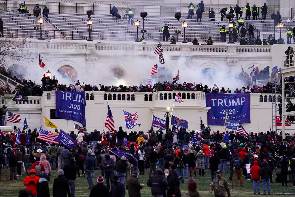 <p>FILE - Violent insurrectionists loyal to President Donald Trump storm the Capitol, Jan. 6, 2021, in Washington.</p>
