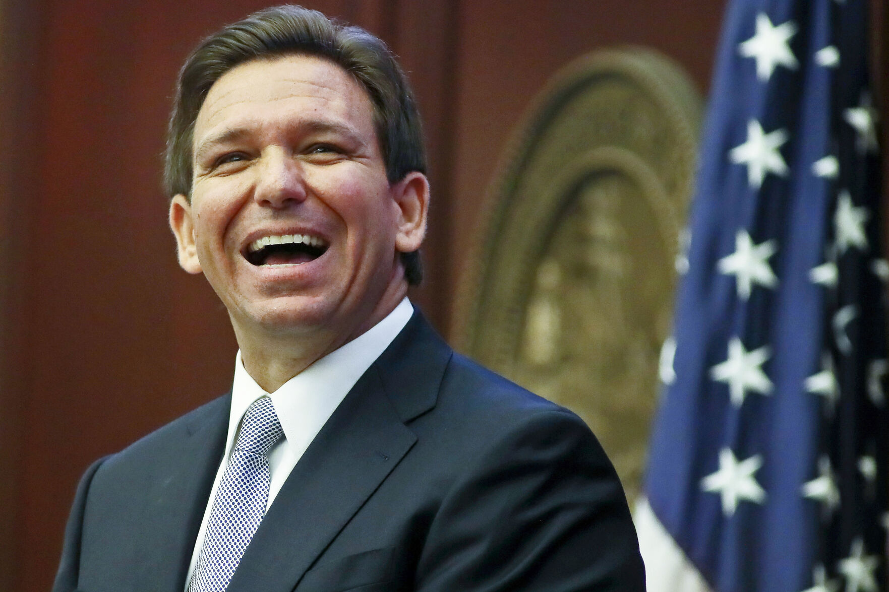<p> Florida Gov. Ron DeSantis reacts to applause as he gives his State of the State address during a joint session of the Senate and House of Representatives on March 7 at the Capitol in Tallahassee, Fla. </p>