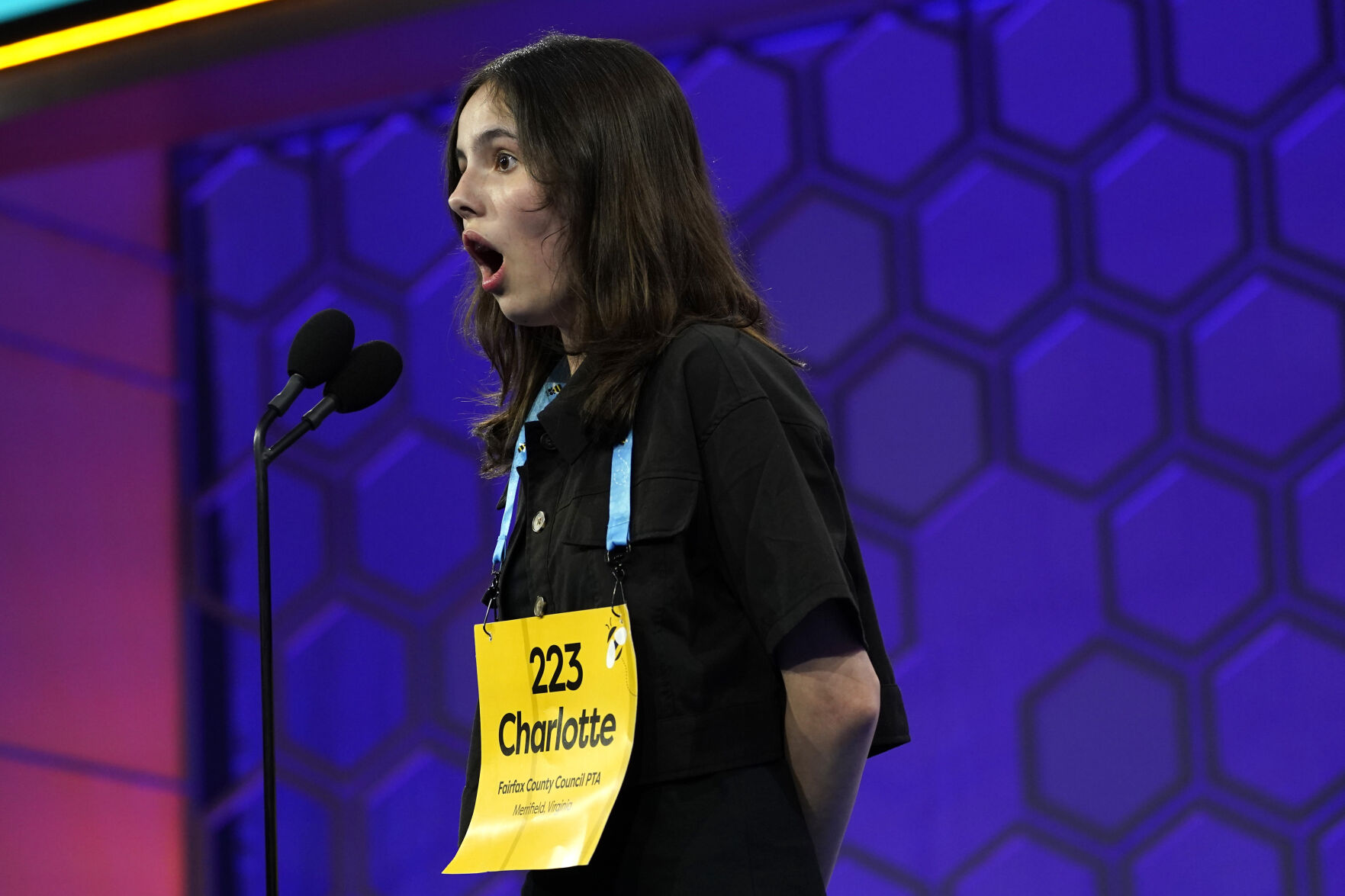 <p>Charlotte Walsh, 14, from Arlington, Va., competes during the finals of the Scripps National Spelling Bee on Thursday in Oxon Hill, Md. </p>
