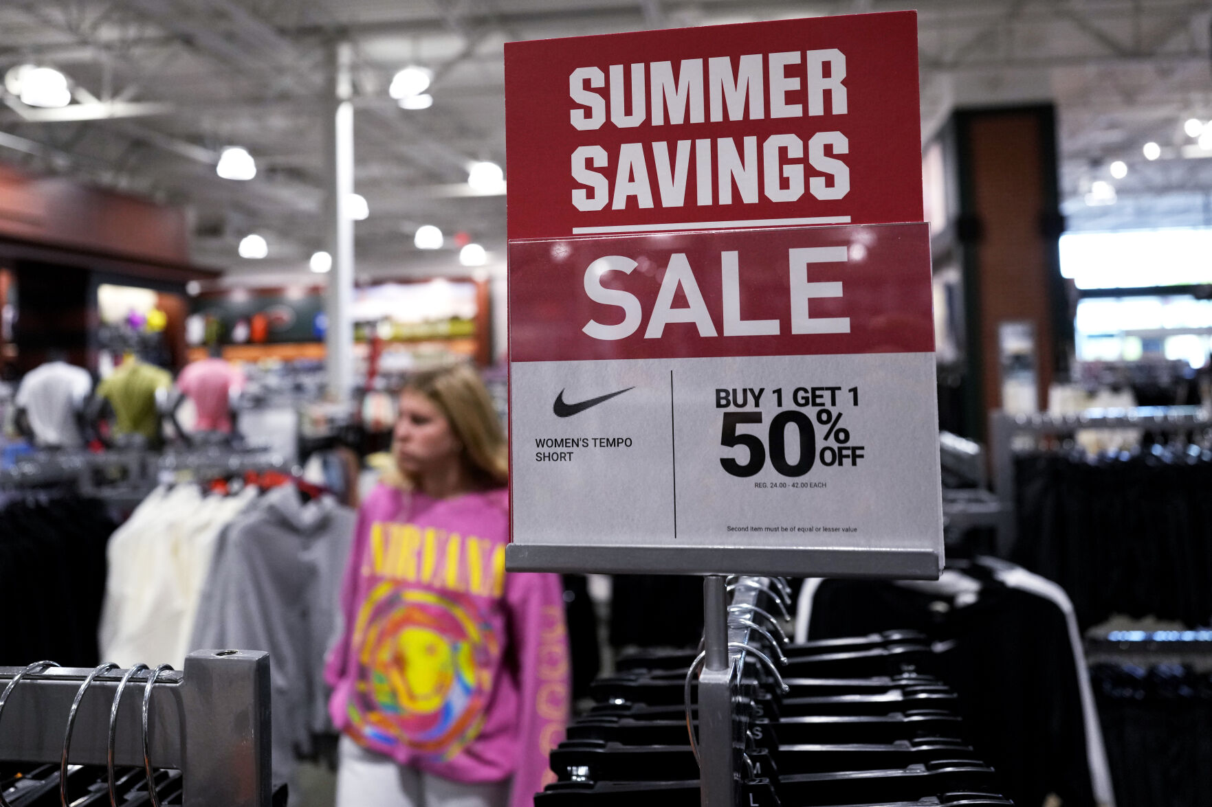 <p>A sale sign is displayed for clothes at a retail store in Vernon Hills, Ill., Monday, June 12, 2023. On Tuesday, the Labor Department reports on U.S. consumer prices for May. (AP Photo/Nam Y. Huh)</p>