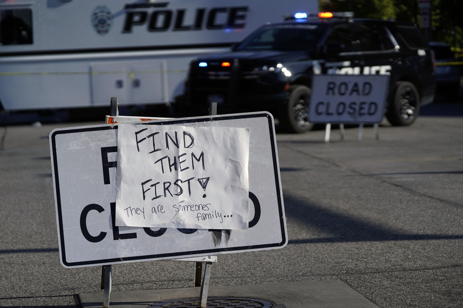 <p>A sign is posted at the scene where an apartment building partially collapsed on Sunday afternoon.</p>