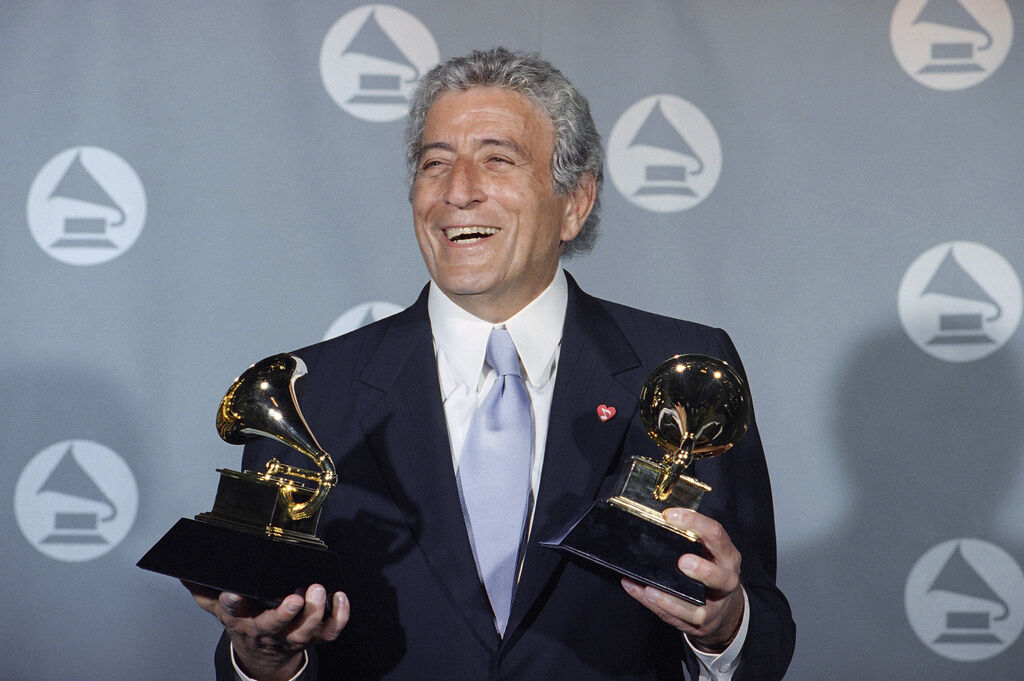 <p>FILE - Veteran singer Tony Bennett displays his two Grammy's backstage at the Shrine Auditorium in Los Angeles Wednesday, March 1, 1995.</p>