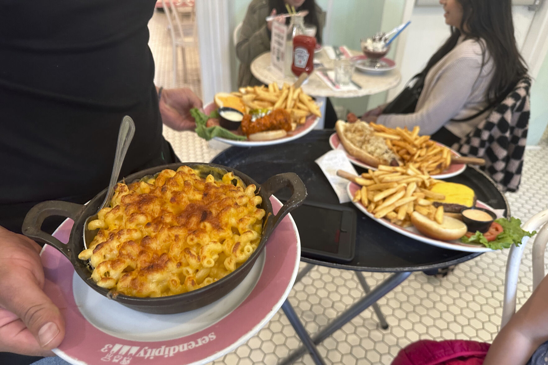 <p>Food is served at Serendipity 3 restaurant in New York City on Sunday, October 8, 2023. On Thursday, the Commerce Department issues its first of three estimates of how the U.S. economy performed in the third quarter of 2023.(AP Photo/Ted Shaffrey)</p>
