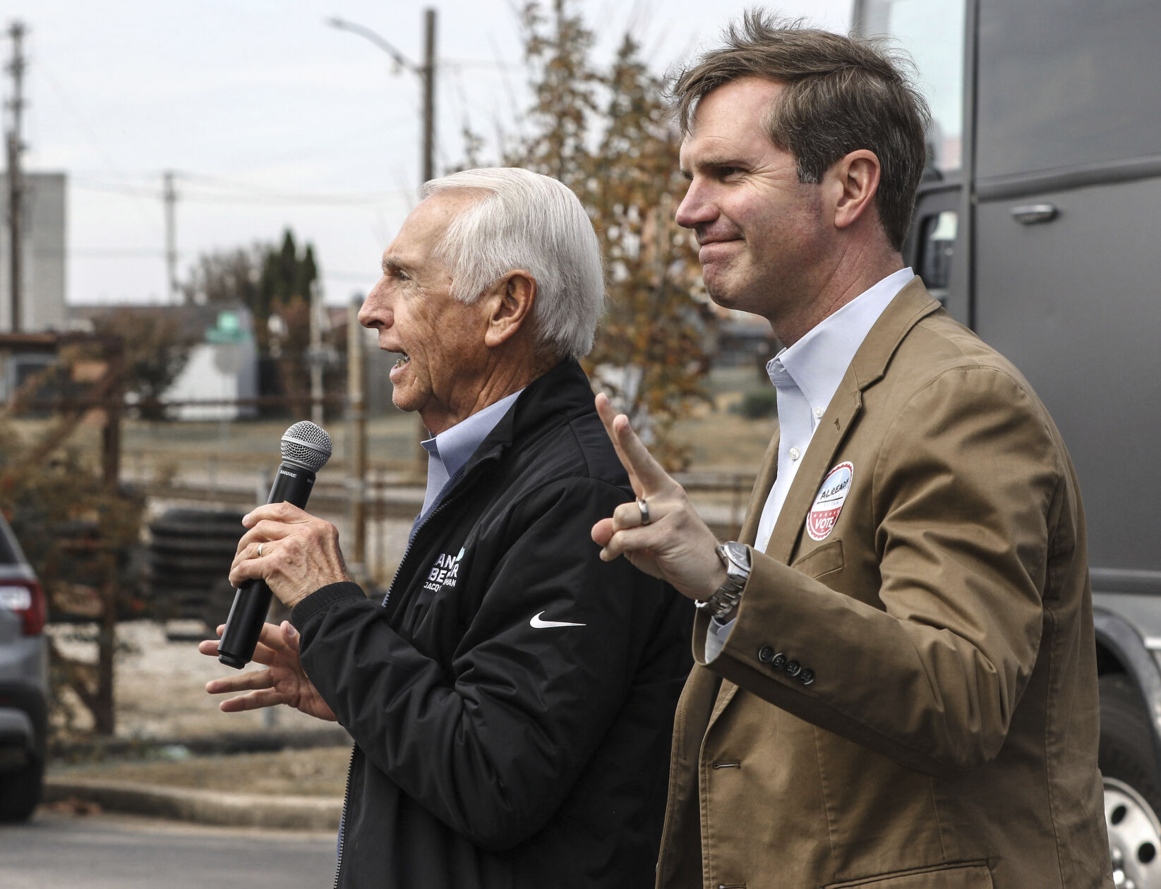 <p>Kentucky Governor and Democratic candidate for re-election Andy Beshear, right, is introduced to supporters by his father, former Kentucky Gov. Steve Beshear, during a campaign stop Saturday in Owensboro, Ky. </p>