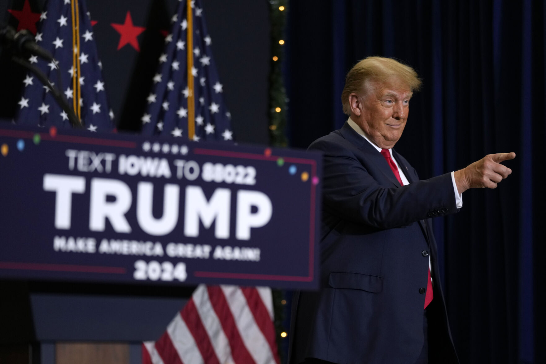 <p>Former President Donald Trump greets supporters as he arrives at a commit to caucus rally, Tuesday, Dec. 19, 2023, in Waterloo, Iowa.  </p>
