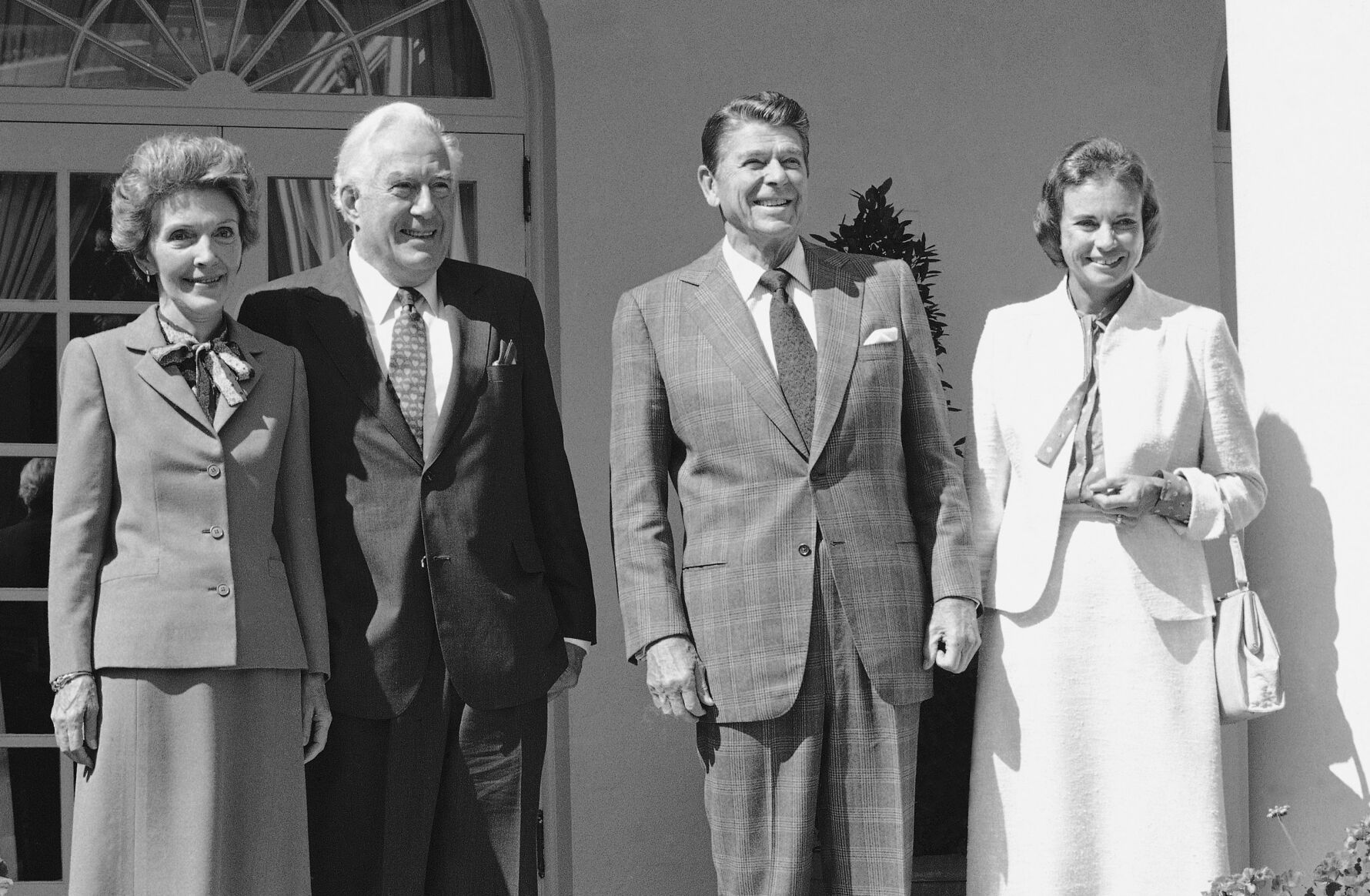 <p>Supreme Court Justice-designate Sandra Day O’Connor, right, poses with first lady Nancy Reagan, Chief Justice of the United States Warren Burger and President Ronald Reagan during a reception for U.S. Apellate Court judges at the White House in Washington, Sept. 24, 1981.</p>