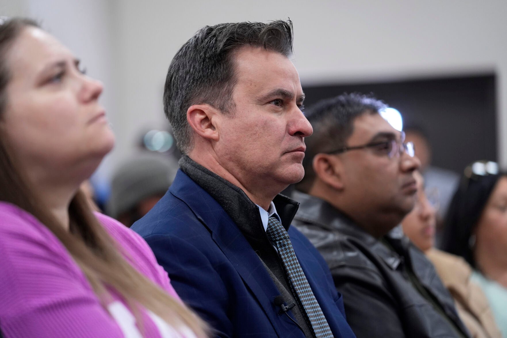 <p>Texas State Sen. Roland Gutierrez, D-Texas, center, sits with family members of shooting victims as they listen to Attorney General Merrick B. Garland and Associate Attorney General Vanita Gupta during a news conference were they shared the findings of a federal report into the law enforcement response to a school shooting at Robb Elementary, Thursday, Jan. 18, 2024, in Uvalde, Texas. </p>
