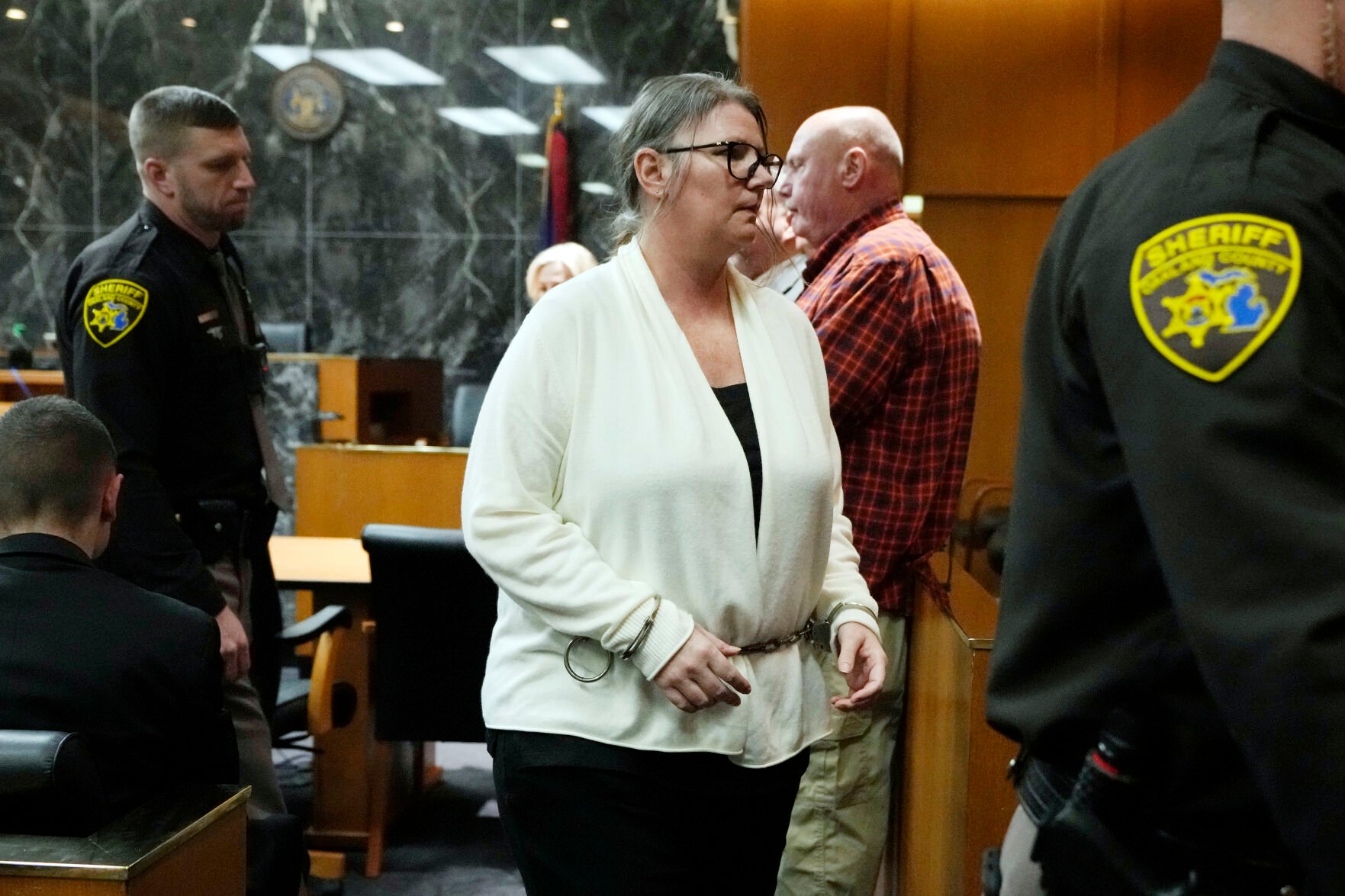 <p>Jennifer Crumbley is escorted away, Monday, Feb. 5, 2024 in Pontiac, Mich. The jury received instructions from a judge and begin deliberations in an unusual trial against a school shooter's mother. The deliberations beginning Monday could send Crumbley to prison if she is convicted of contributing to the deaths of four students in 2021.</p>