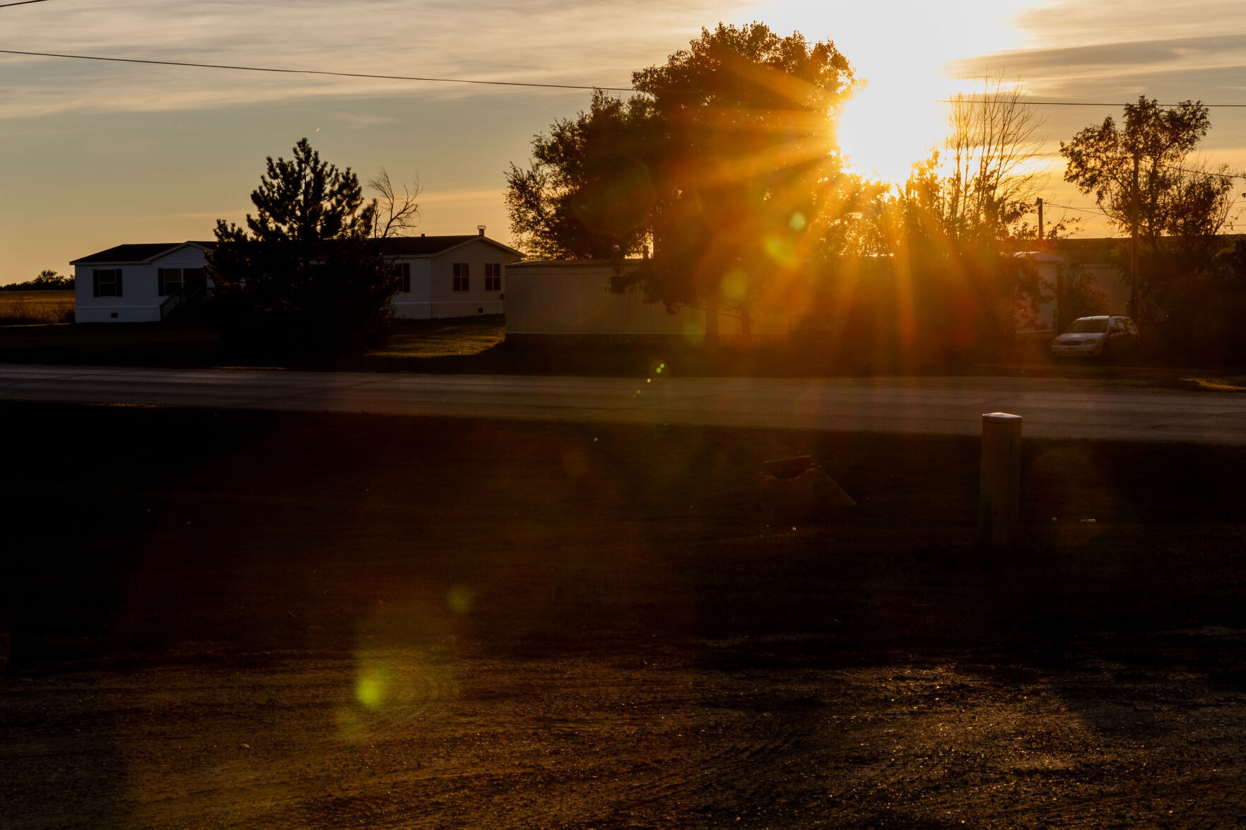 <p>The sun sets in St. Francis, S.D., on the Rosebud Indian Reservation on Monday, Oct. 16, 2023.</p>