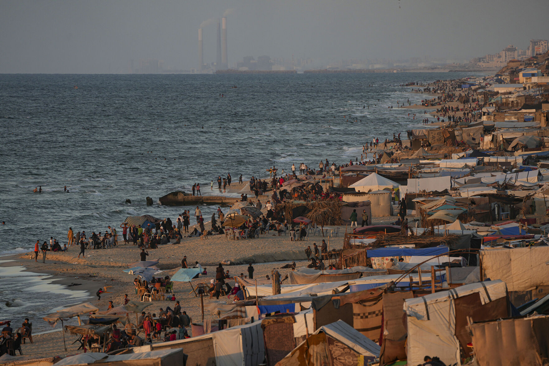 <p>Tents are crammed together Wednesday as displaced Palestinians camp along the beach of Deir al-Balah, central Gaza Strip.</p>