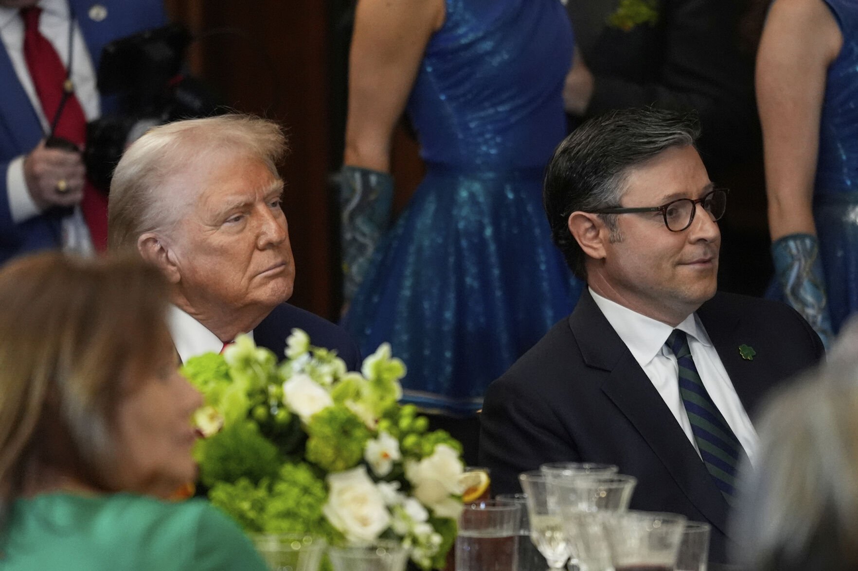 <p>President Donald Trump and House Speaker Mike Johnson, R-La., attend the annual St. Patrick's Day luncheon Wednesday at the Capitol in Washington.</p>