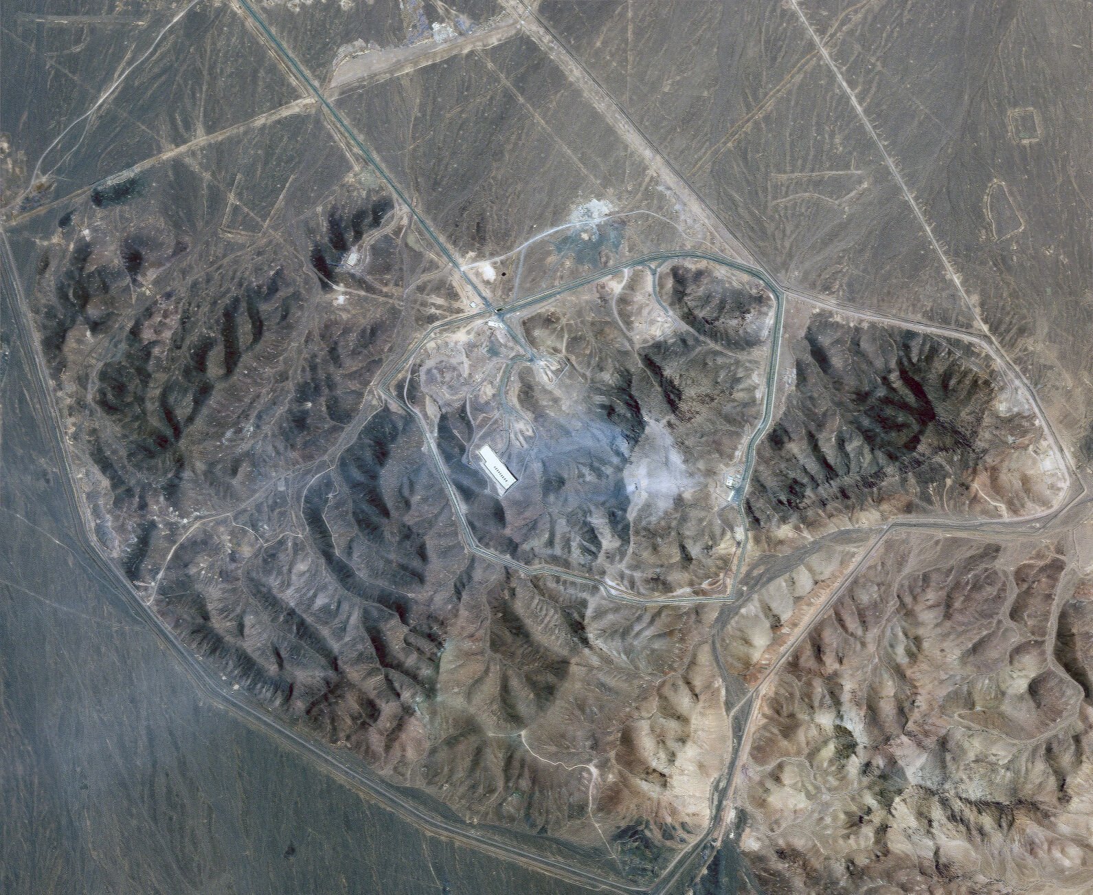 <p>This satellite picture by Planet Labs PBC shows Iran's underground nuclear enrichment site at Fordo following U.S. airstrikes targeting the facility, on Sunday, June 22, 2025. (Planet Labs PBC via AP)</p>