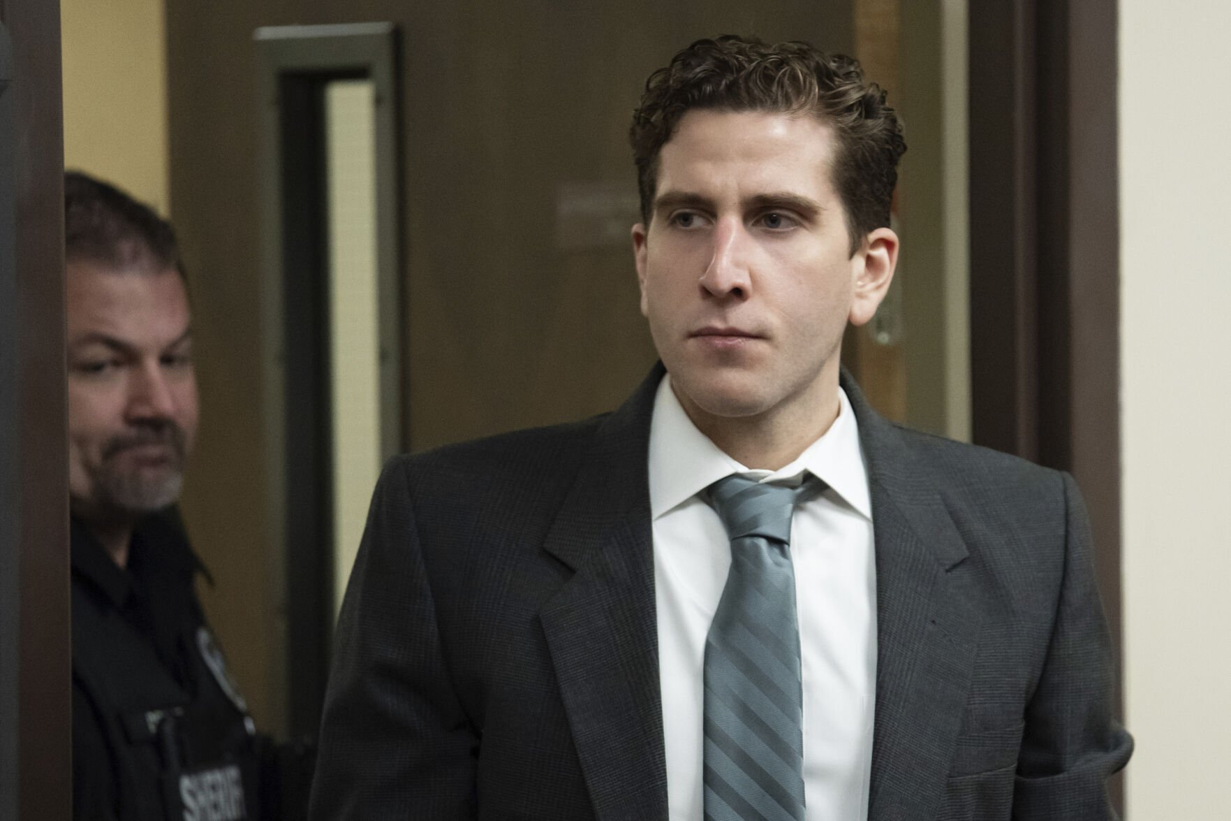 <p>Bryan Kohberger, the man accused of fatally stabbing four University of Idaho students, is escorted into court for a hearing Sept.13, 2023, in Latah County District Court in Moscow, Idaho.</p>