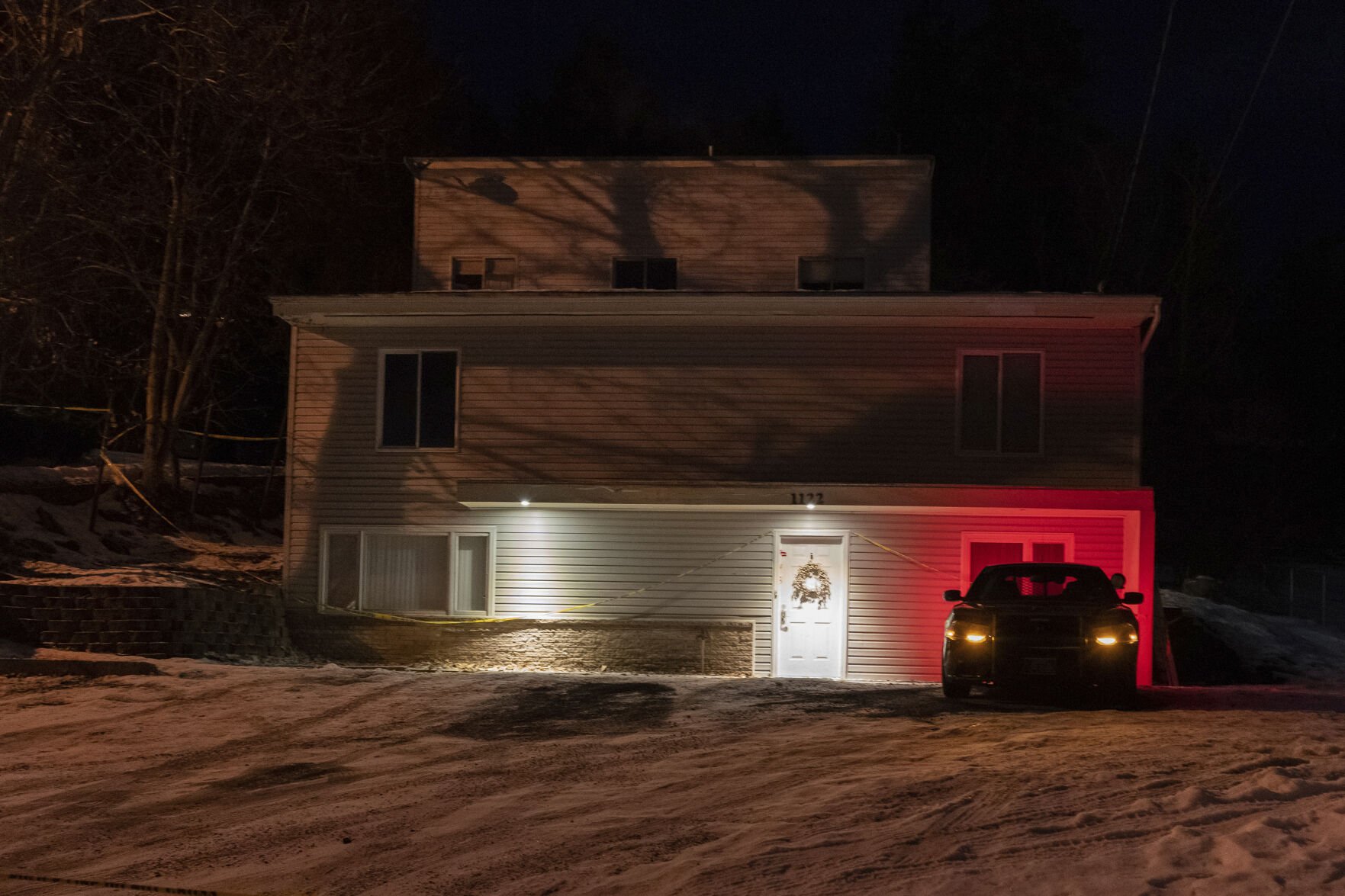 <p>A private security officer sits in a vehicle Jan. 3, 2023, in front of the house in Moscow, Idaho, where four University of Idaho students were killed in November 2022.</p>