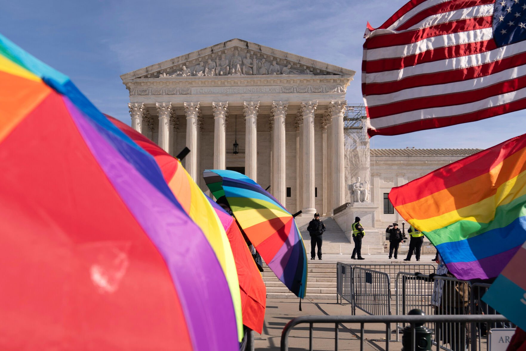 <p>Transgenders rights supporters rally outside of the Supreme Court, Dec. 4, in Washington.</p>