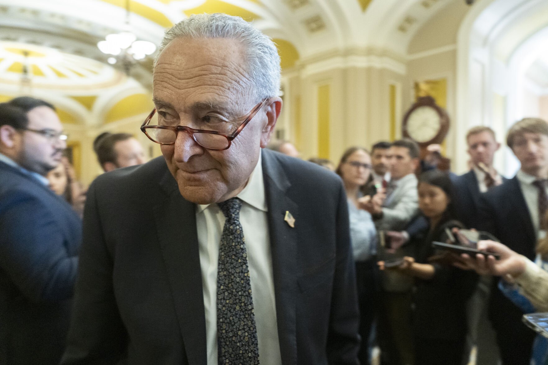 <p>Senate Minority Leader Chuck Schumer, D-N.Y., speaks to reporters outside the Senate chamber as Republicans begin a final push to advance President Donald Trump's tax breaks and spending cuts package, at the Capitol in Washington, June 30.</p>
