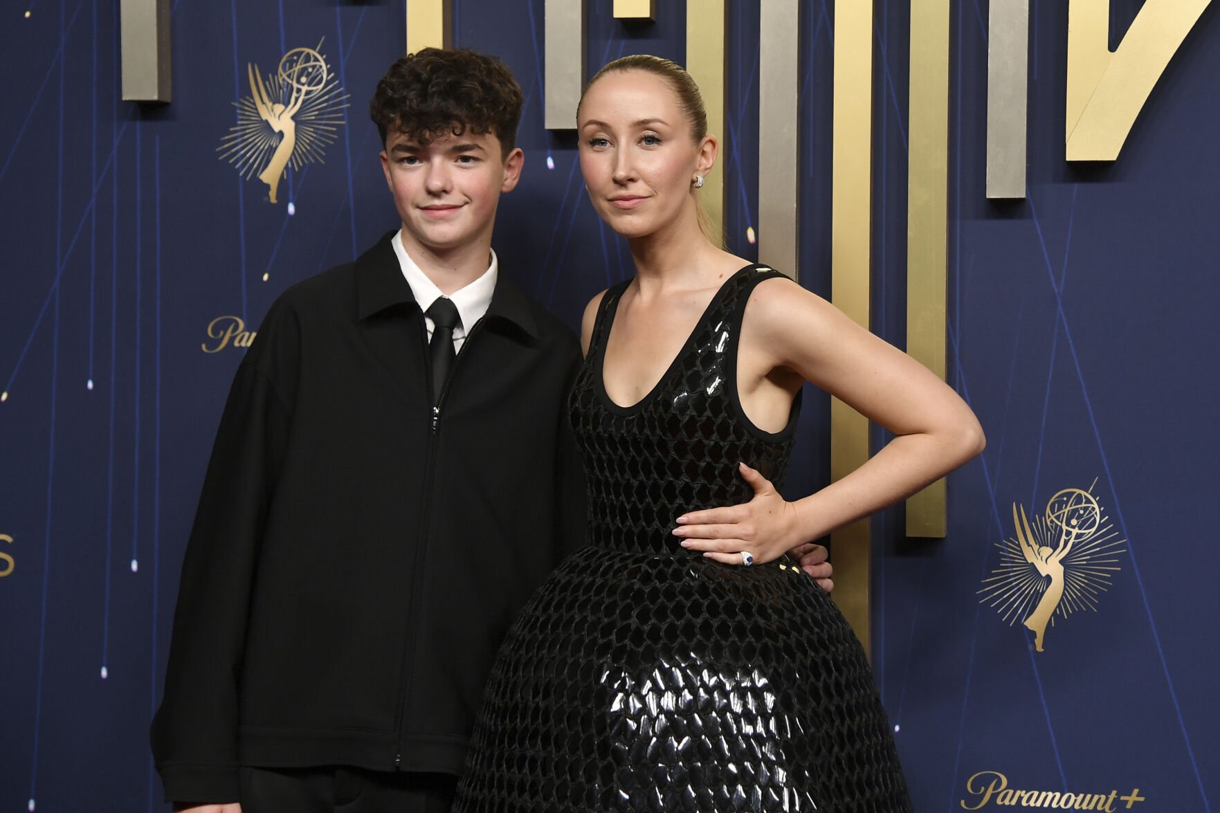 <p>Owen Cooper, left, and Erin Doherty arrive at the 77th Primetime Emmy Awards on Sunday, Sept. 14, 2025, at the Peacock Theater in Los Angeles. (Photo by Richard Shotwell/Invision/AP)</p>