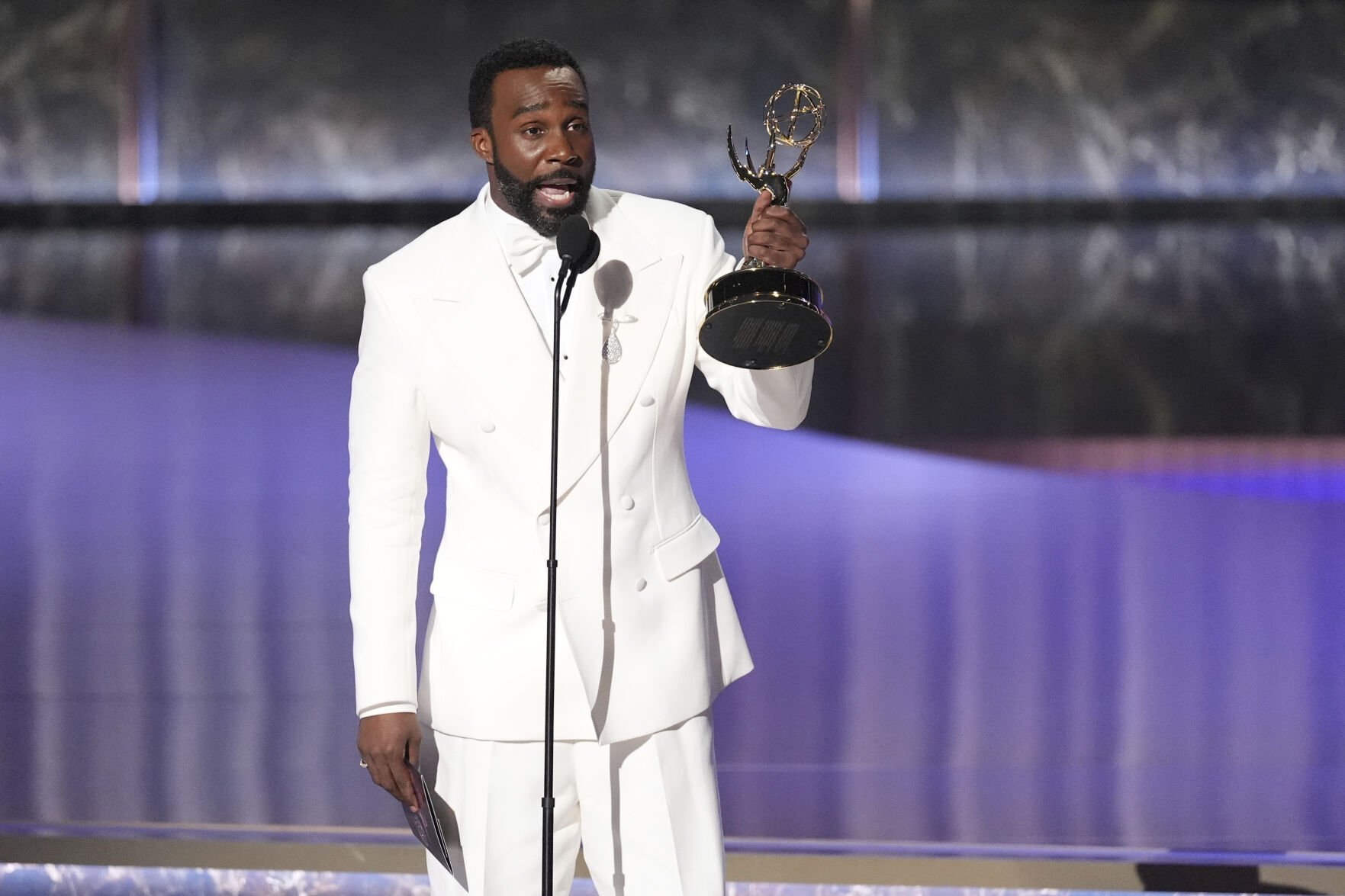 <p>Tramell Tillman accepts the award for outstanding supporting actor in a drama series for "Severance" during the 77th Primetime Emmy Awards on Sunday, Sept. 14, 2025, at the Peacock Theater in Los Angeles. (AP Photo/Chris Pizzello)</p>