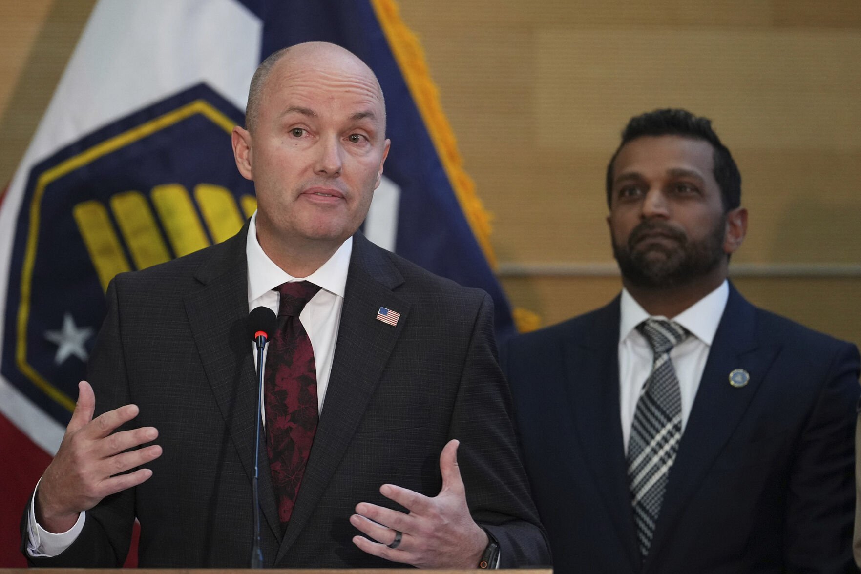 <p>Utah Gov. Spencer Cox speaks Friday at a news conference as FBI Director Kash Patel looks on in Orem, Utah. </p>